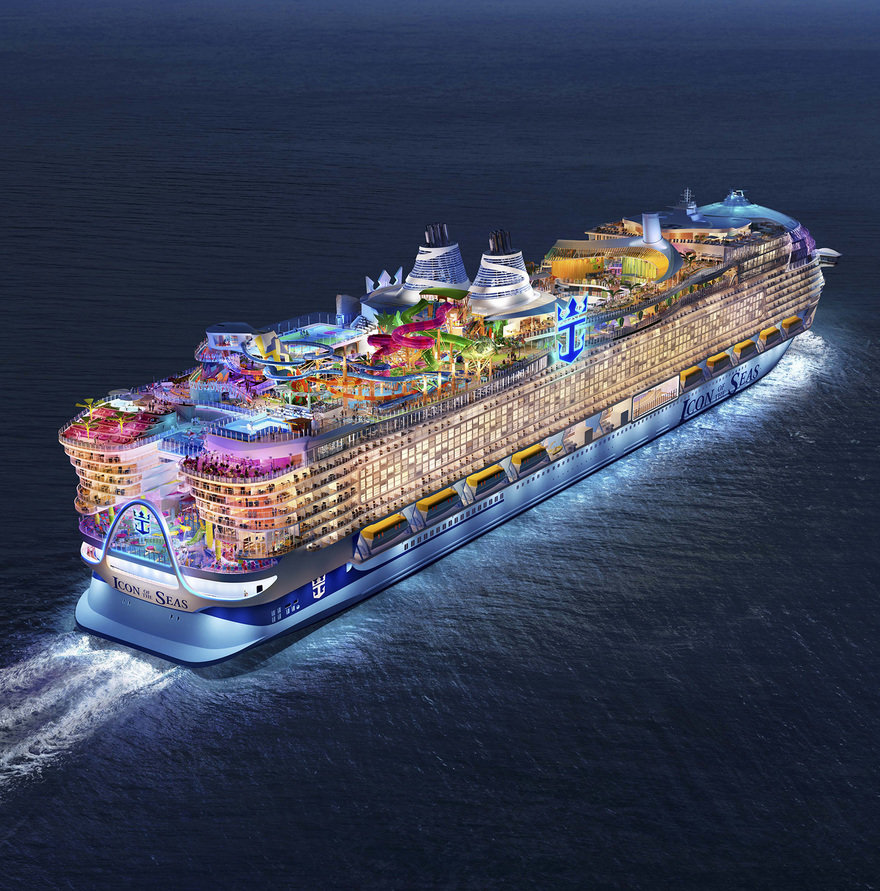 Aerial view of Royal Caribbean's Icon of the Seas cruise ship at dusk with lights on as it traverses the open ocean representing the top-of-the line all-inclusive cruise into your dream vacation experience.